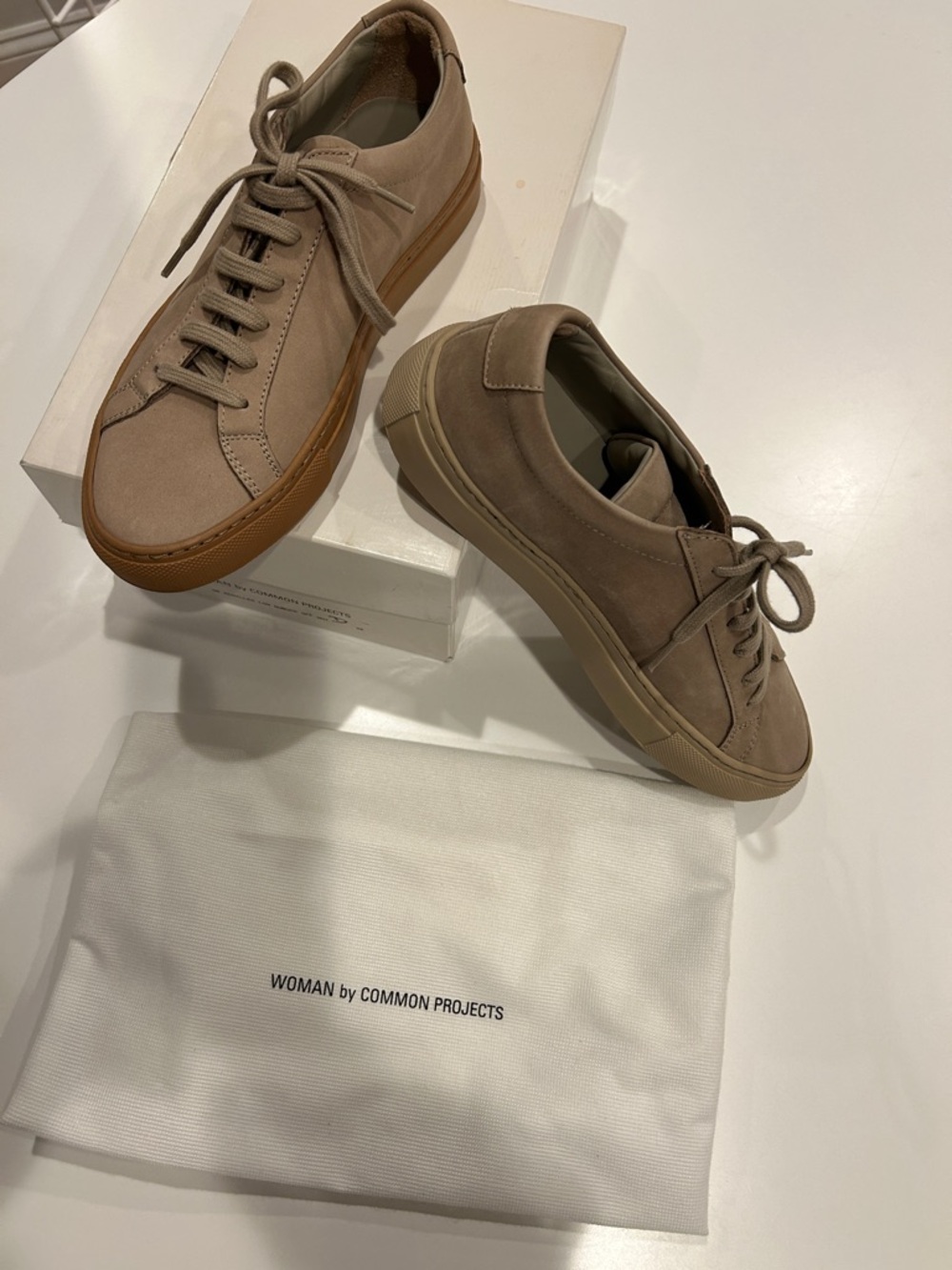 Common Projects Nubuck Low-Top Sneakers in Taupe with different color Gum Soles